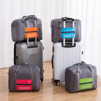 4-Pack Foldable Travel Duffel Bag Set – Compact Carry-On Luggage in Pink, Blue, Green & Orange | Perfect for Family Trips, Gifts & Organized Travel