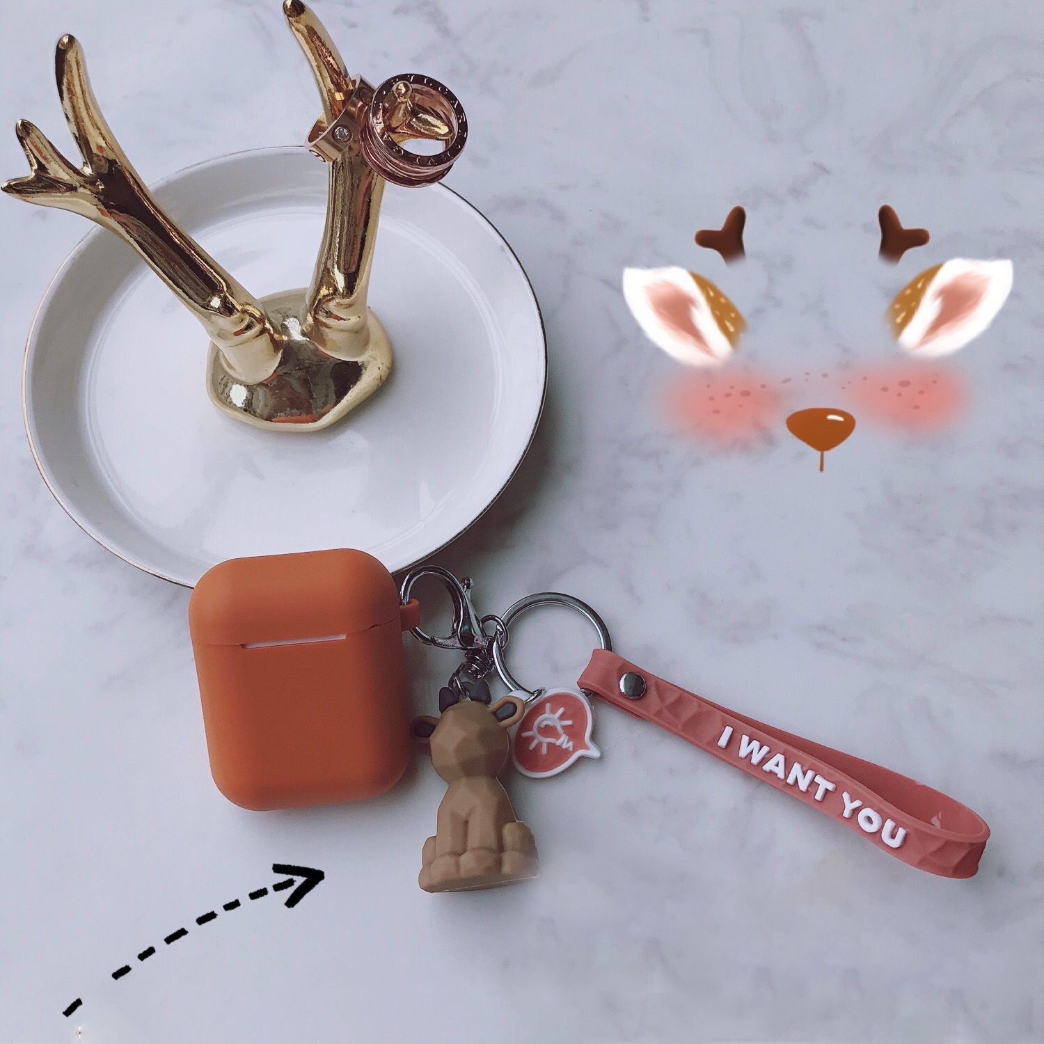 Brown jumpsuit + geometric reindeer Apple AirPods 3