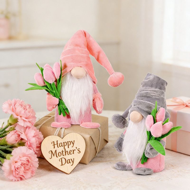 1pc Plush standing gnome doll β faceless old man figurine, festive tabletop ornament and gift.Pink faceless old man gnome holding a bouquet