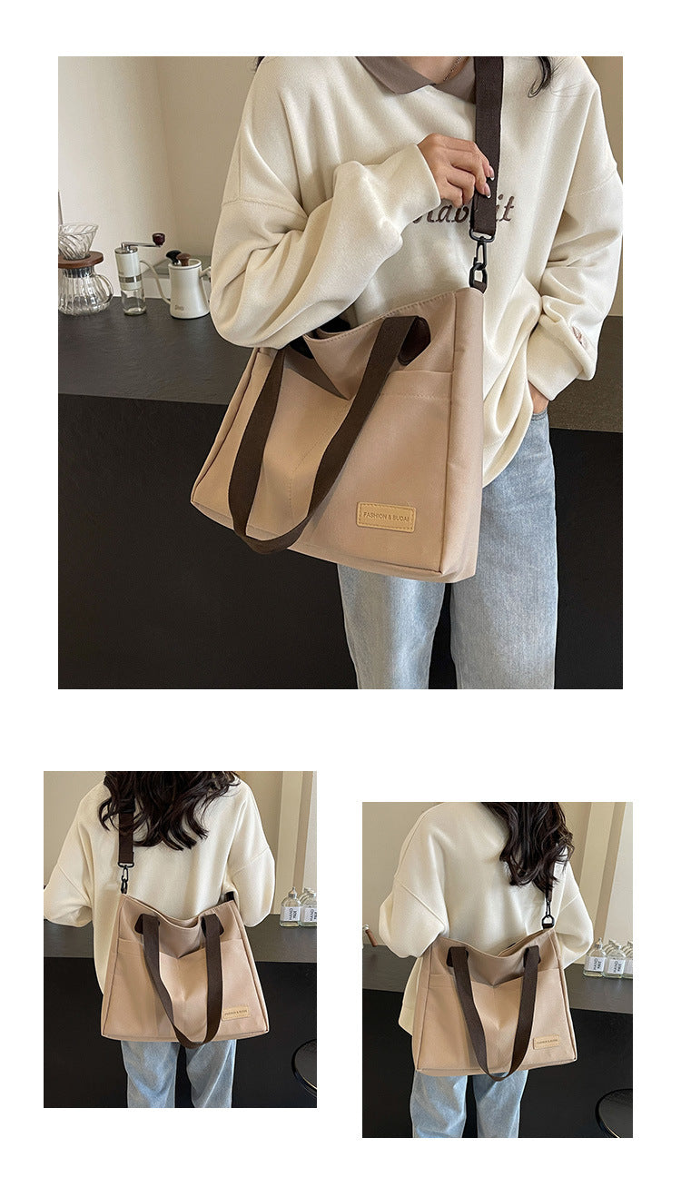 Stylish khaki canvas tote bag with detachable shoulder strap
