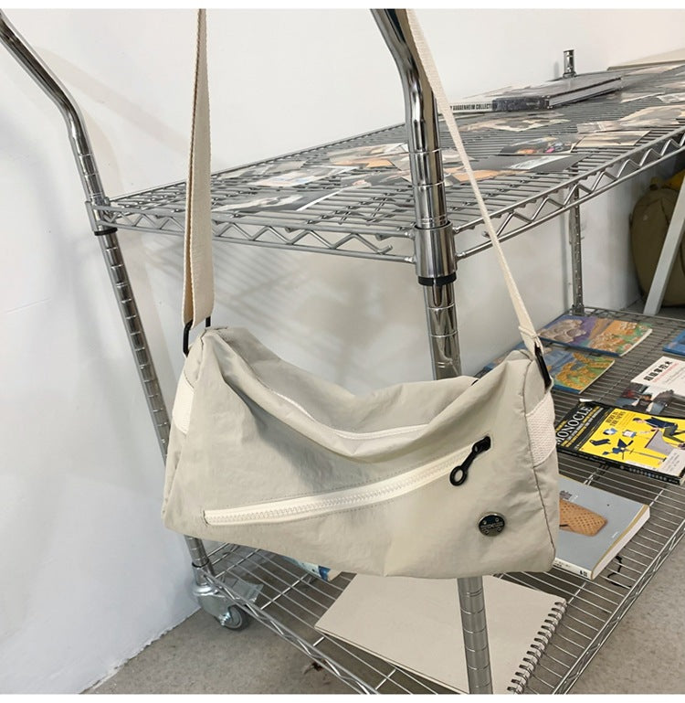 An elegant white shoulder bag for travel and work