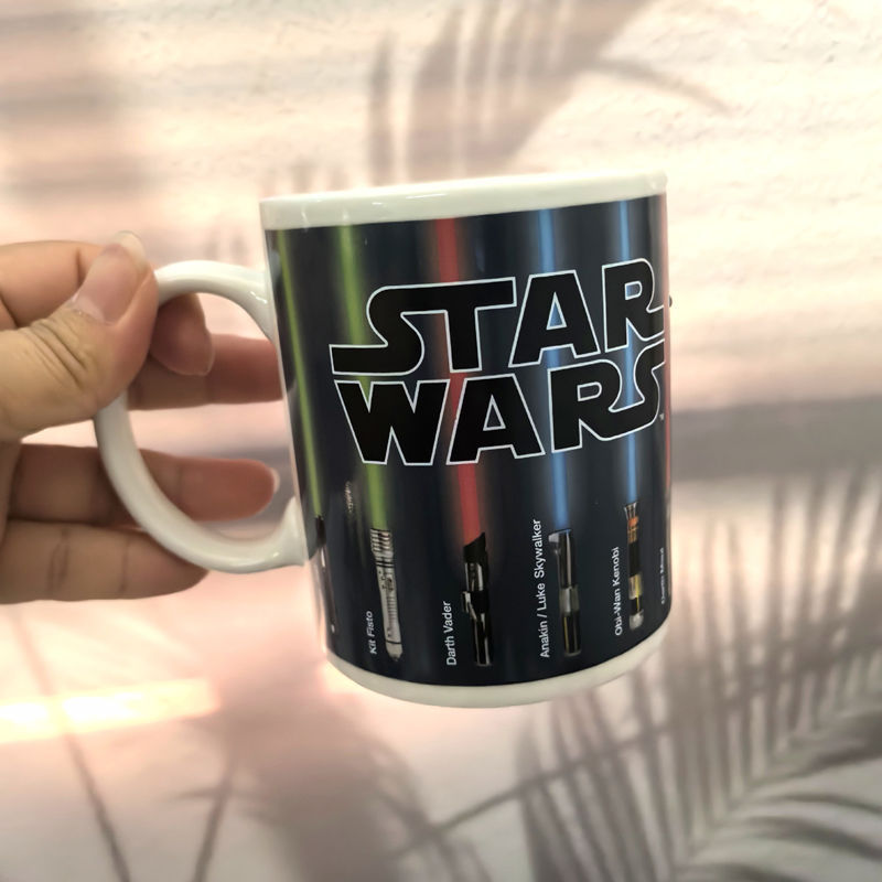 Black Star Wars Lightsaber Heat Changing Mug - Magic Color Reveal Ceramic Coffee Cup, 330ml Heat Sensitive Thermochromic Mug, Novelty Gift for Sci-Fi Fans