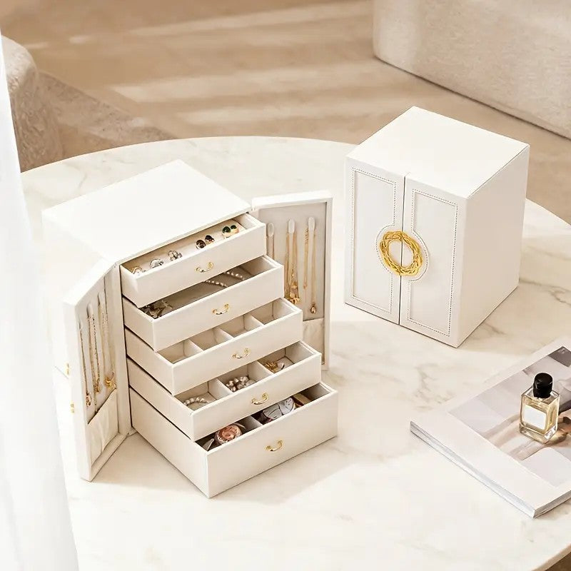 White   1 Large Faux Leather Jewelry Storage Box with 5 Drawers and Gold Handles - An elegant rectangular storage space for rings, necklaces, bracelets, earrings, and watches - Features soft fabric lining, side door design, textured surface finish - Luxur