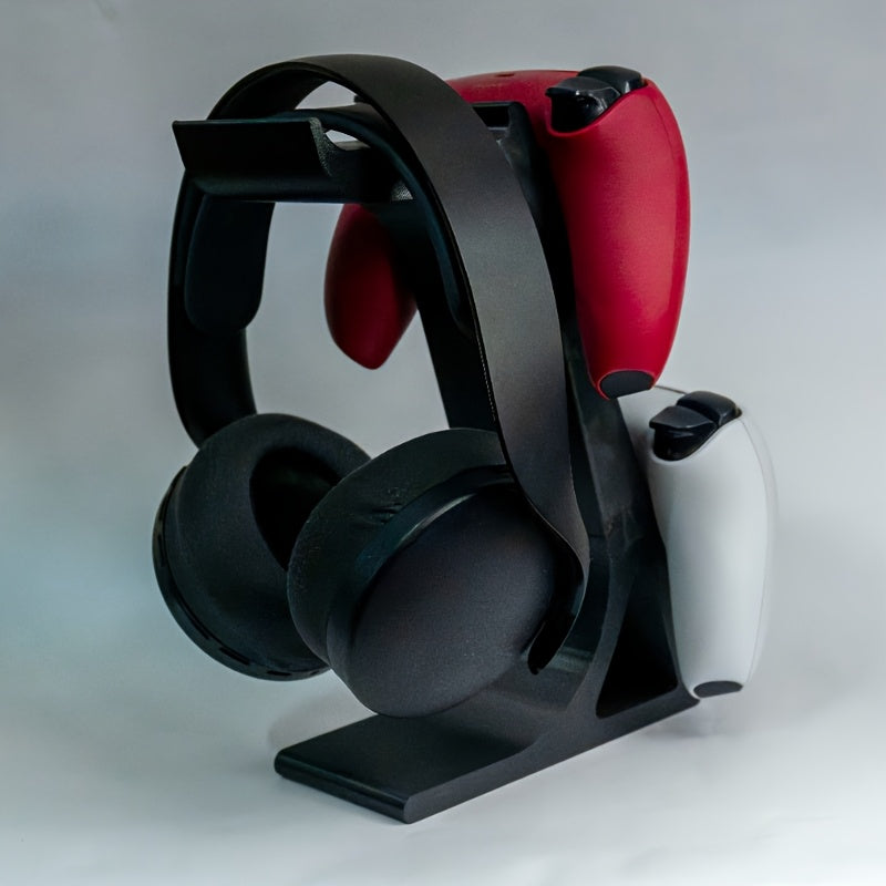 black 3-in-1 PS5 and Xbox Controller Stand – Compatible with PlayStation 5/Xbox Consoles. A gaming desktop organizer with a headphone hanger, non-charging base that holds 2 controllers and headphones. Space-saving white/black console accessory.