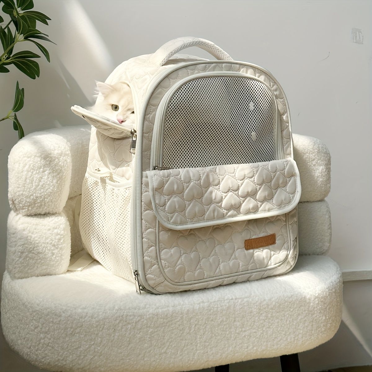 White cat backpack carrier, pet travel carrier, breathable cat backpack, stylish cat carrier, cat supplies Australia, durable cat carrier, padded cat backpack