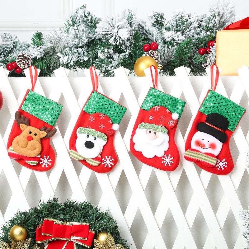 Christmas Stockings (Set of 4) - Includes Snowman, Polar Bear, Santa Claus, and Reindeer, Red & Green, with Snowflake Accents