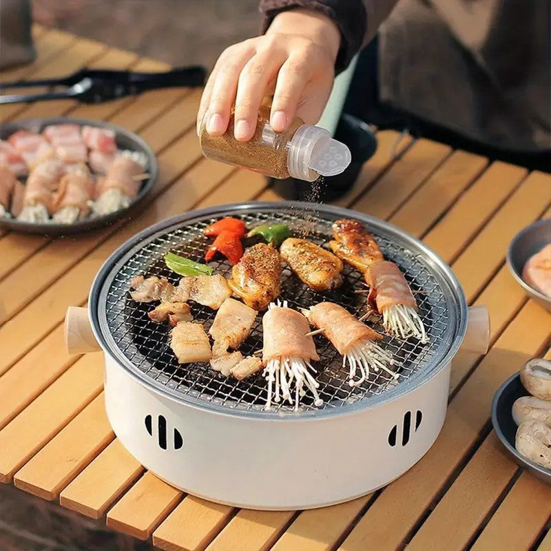 Portable mini tabletop barbecue grill, made of stainless steel, includes a grill mesh, designed for home use, and functions as a detachable charcoal grill.