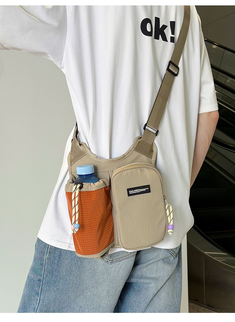 Women's Crossbody Phone Bag, Dopamine Color-Block Drawstring Bucket Bag, Pendant Accent Women's Backpack, Lightweight Casual Bag, Perfect for Commuting, Travel & Cycling..(khaki)