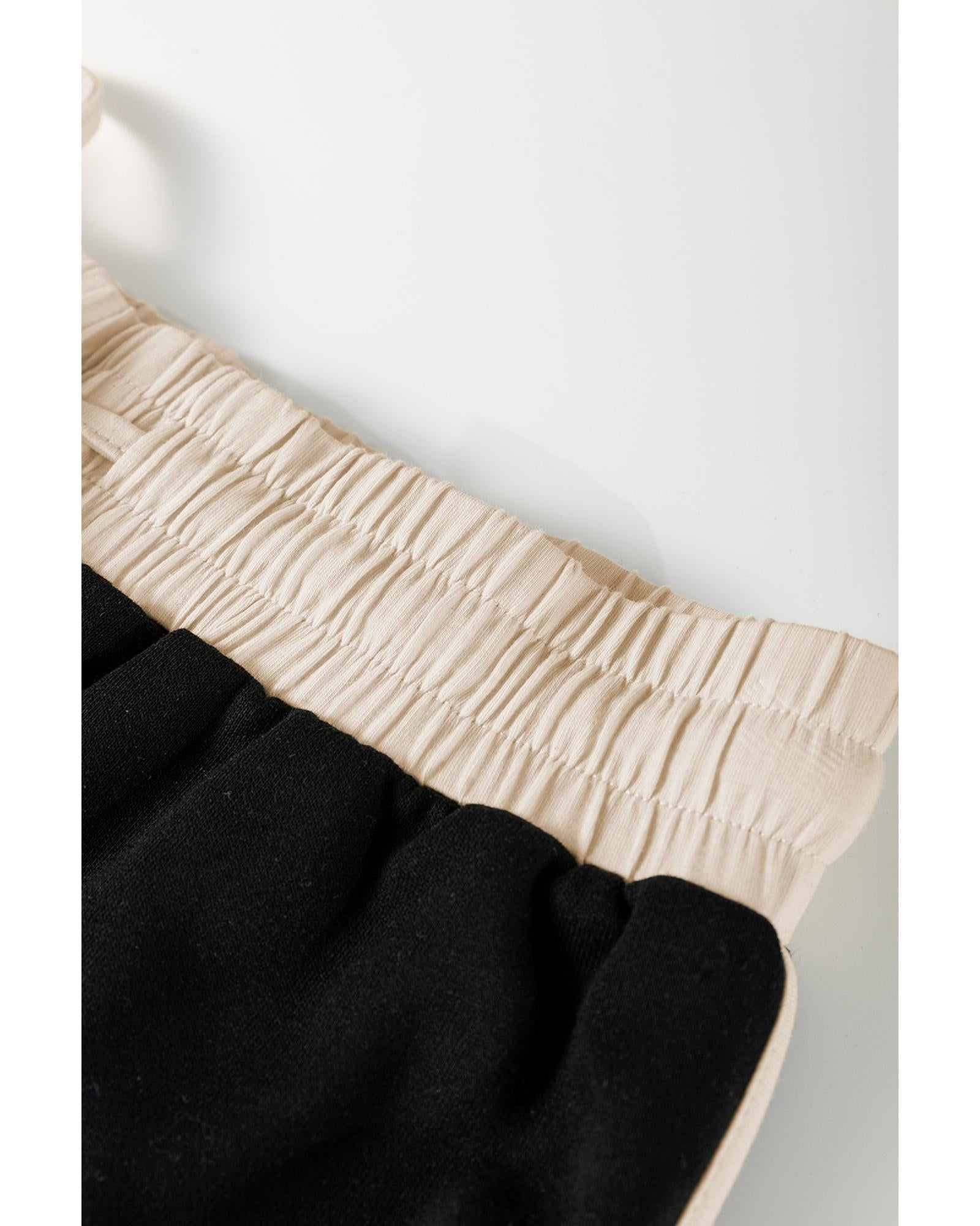 Black Color Contrast Loose Pullover and Lace-up Waist Skort Set - M