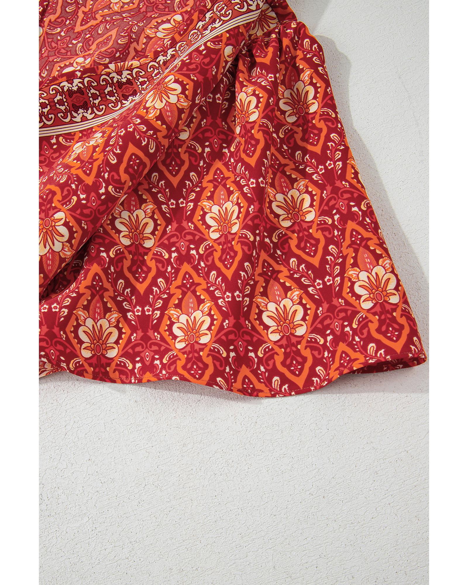 Orange Plus Size Printed Surplice Neck Empire Waist Flowy Mini Dress - 2X
