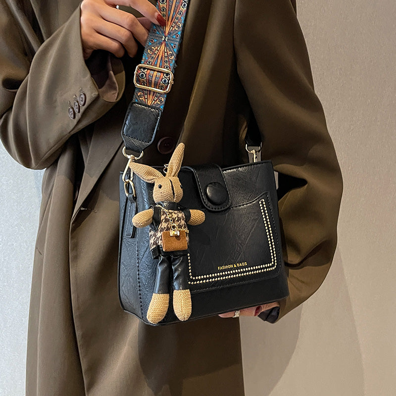Vintage Style PU Leather Bucket Bag with Wide Patterned Strap & Optional Bunny Charm(black)