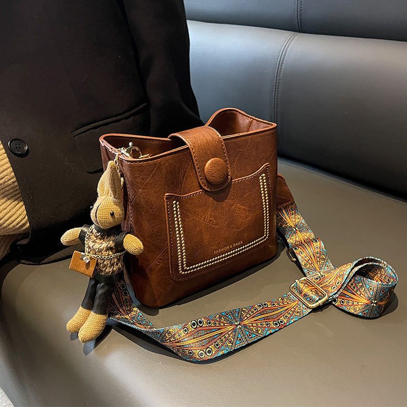 Vintage Style PU Leather Bucket Bag with Wide Patterned Strap & Optional Bunny Charm(red brown)