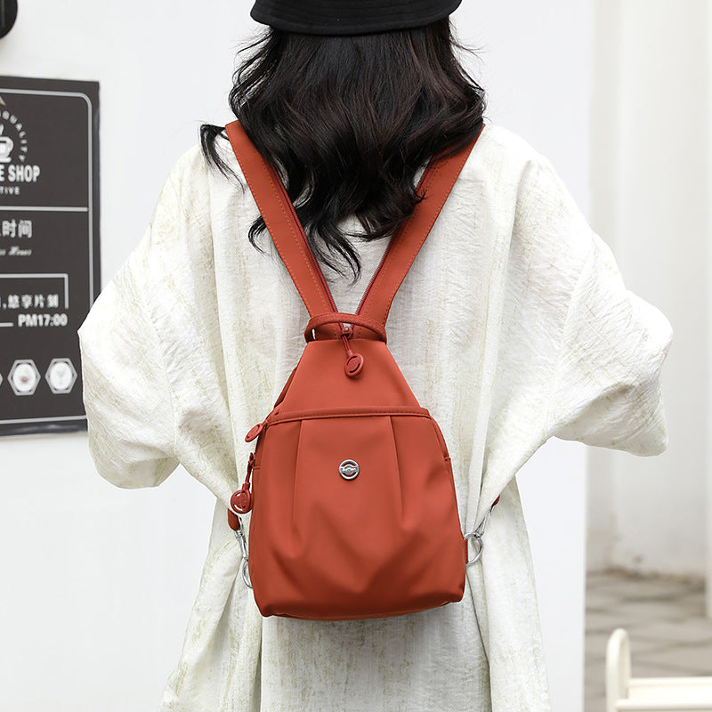 Black Versatile Women's Convertible Mini Backpack & Sling Bag - Stylish Anti-Theft Oxford Cloth Daypack, Fits 9.7in iPad