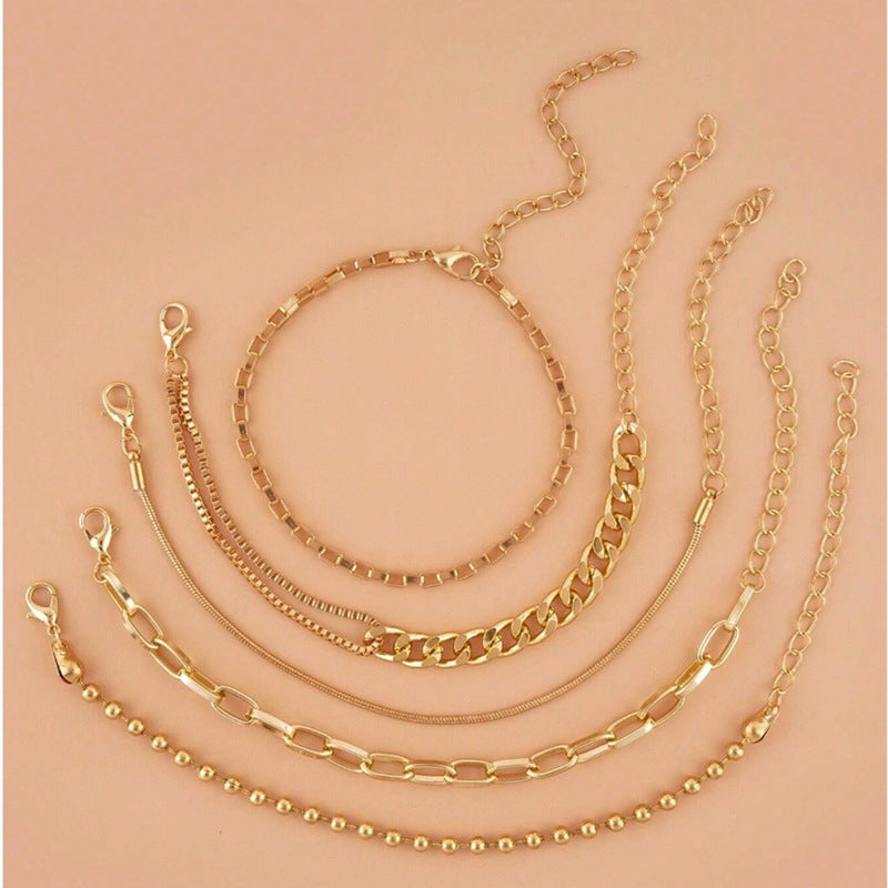 A golden five-piece set Chic Multi-Layered Alloy Bracelet Set - Fashionable Stackable Jewelry
